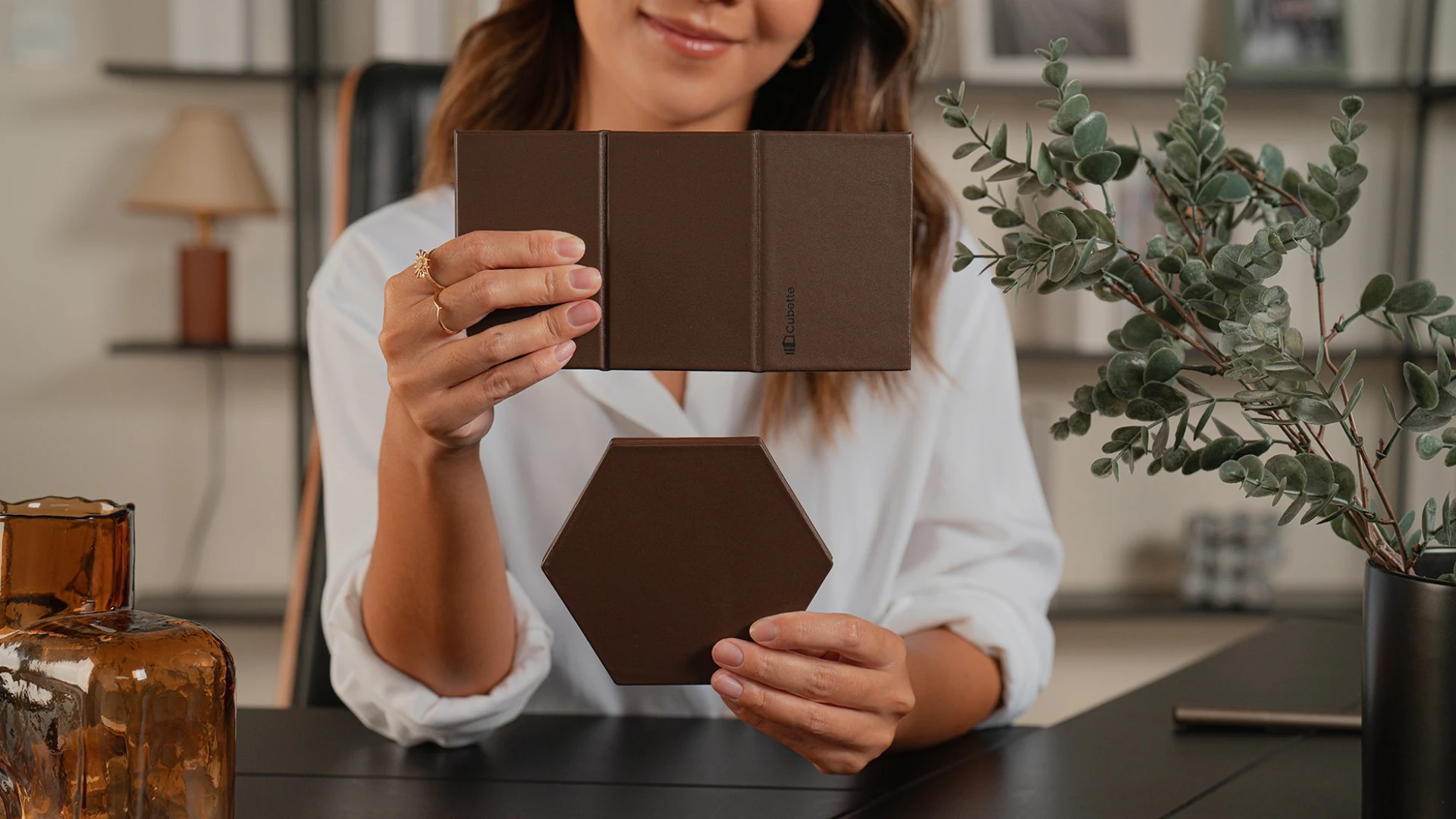 Cubette fold-flat construction shown in hand